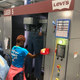 A Levi’s employee gets a pair of jeans ready for finishing.